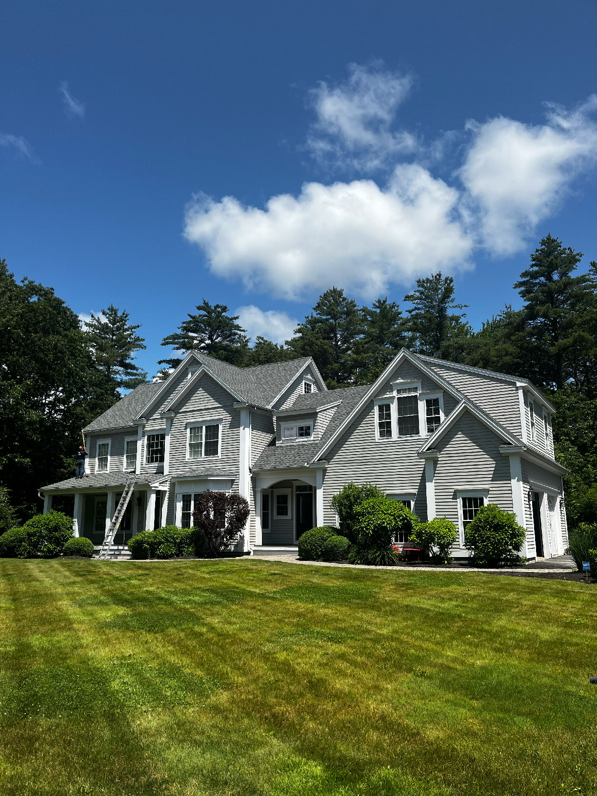 House washing in progress on a Falmouth home