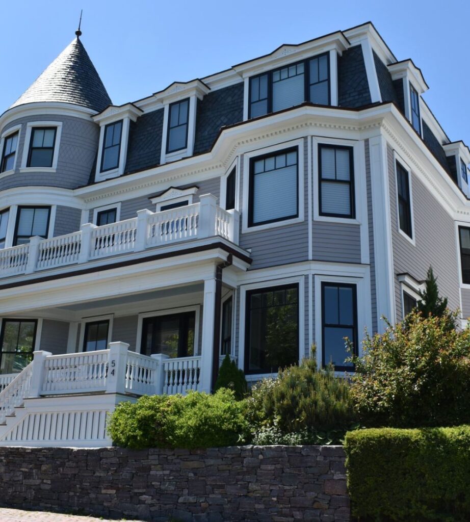 Gray residential home newly washed by soft washing 